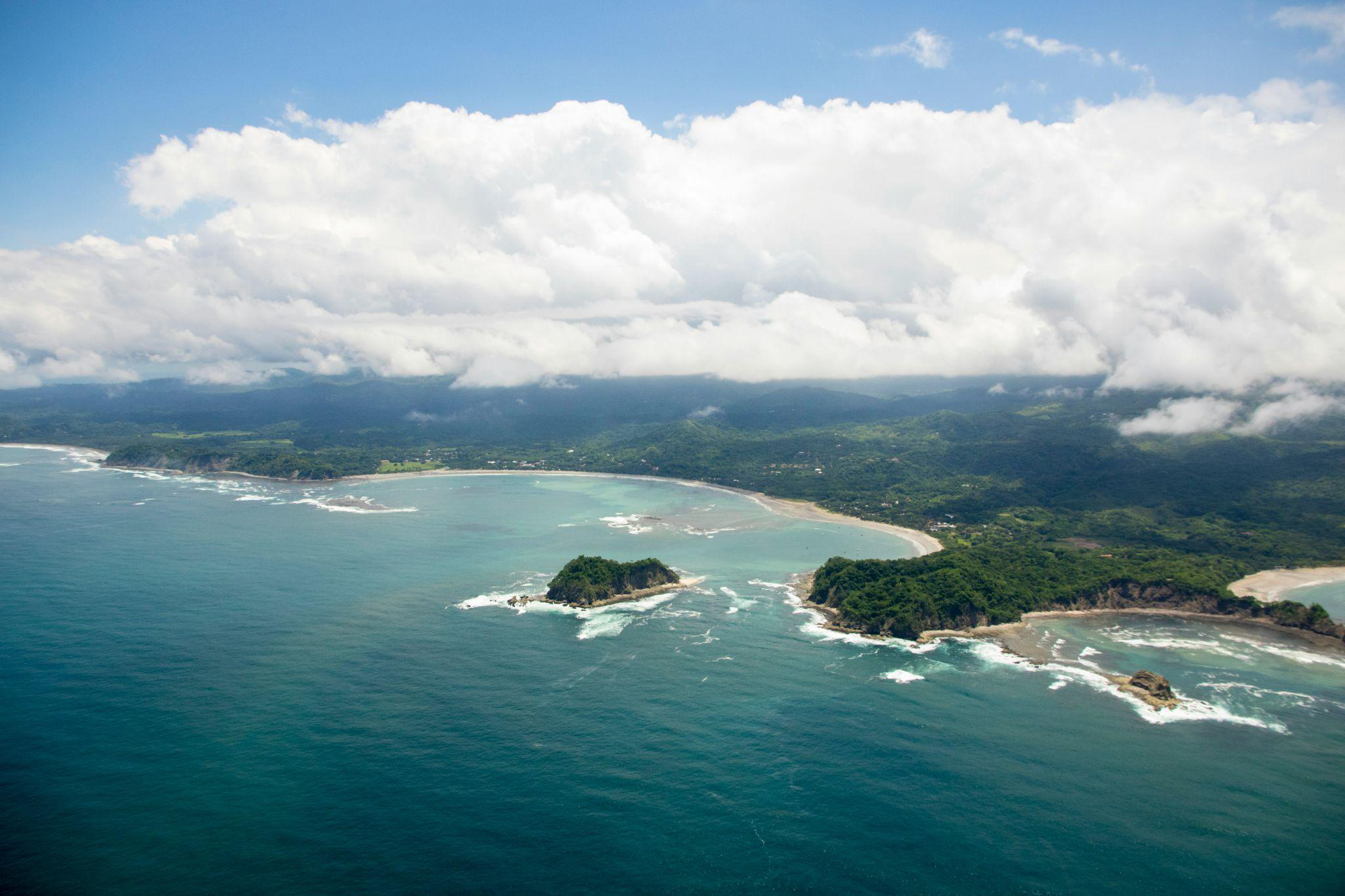 Aerial view of Guanacaste’s Pacific coastline with beaches and ocean.