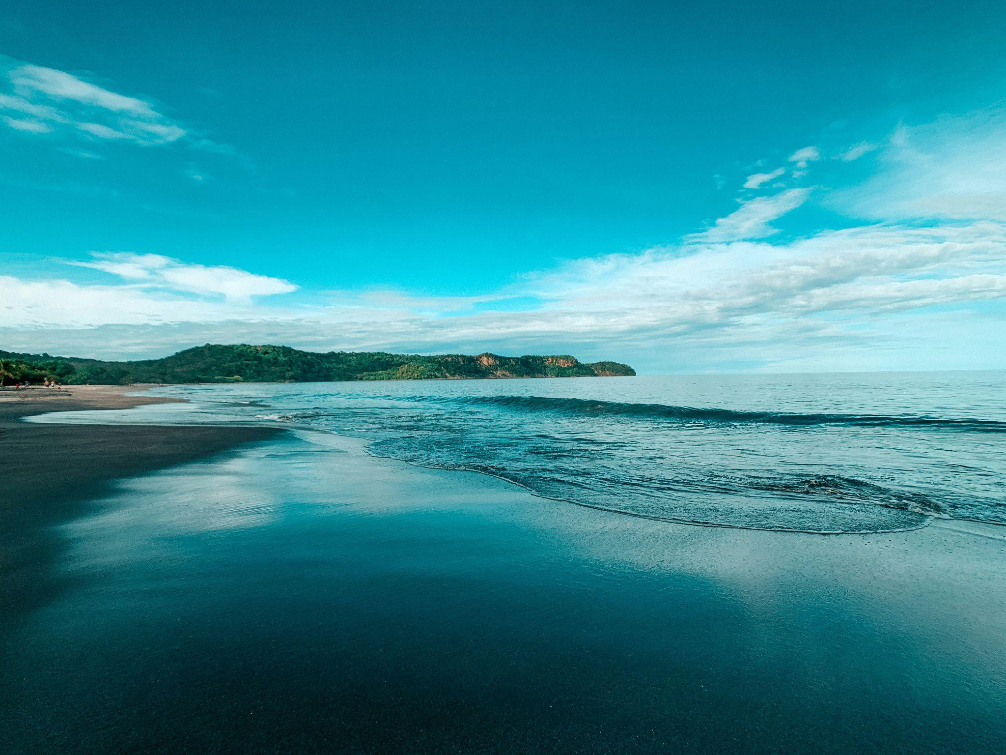 Blue sea and clear blue sky during daytime in Guanacaste, Costa Rica.