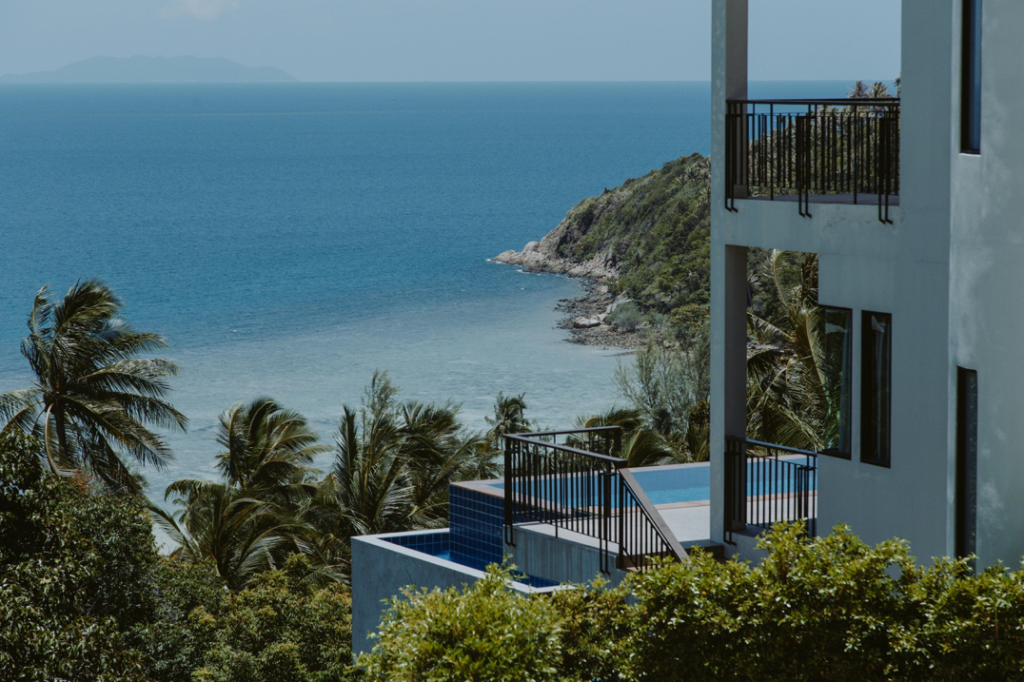 a balcony overlooking a beach